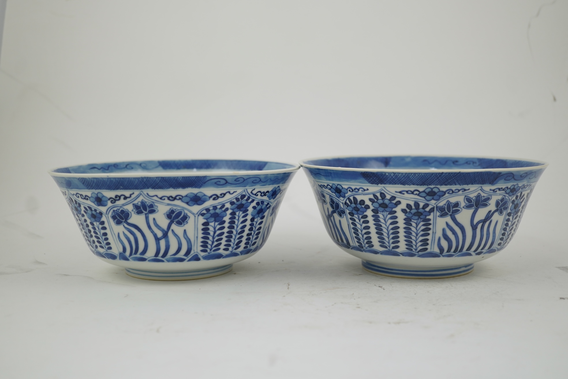 A pair of Chinese blue and white bowls, Kangxi four character mark, 19th century